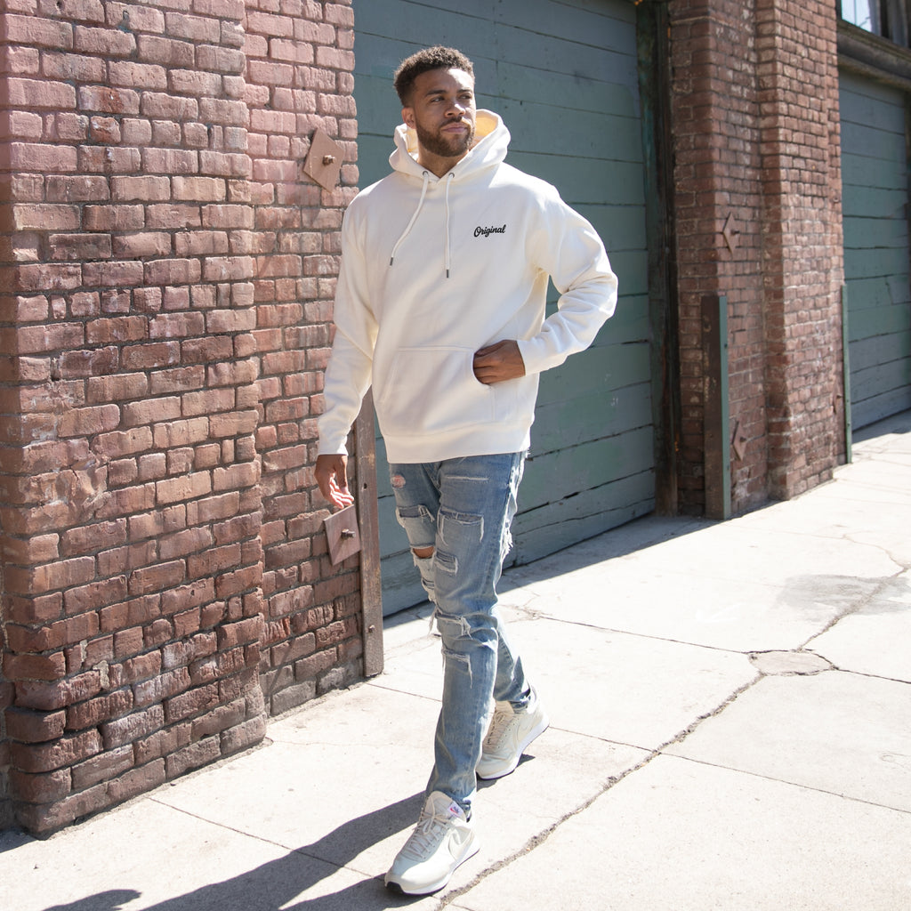 Full body model wearing Original Old School Bone Hoodie in Bone.